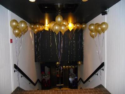 golden balloons at a corporate event