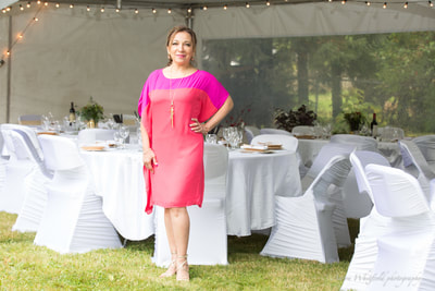 Wedding planner in front of dining area in Terrace BC