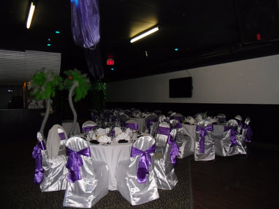 table and seat settings at a corporate event