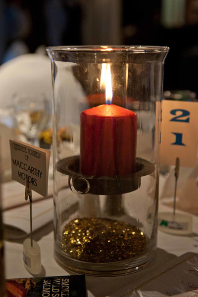 candle setting at corporate event