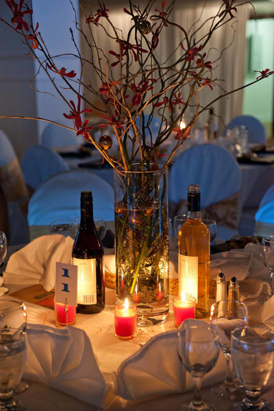 wine and flowers center piece at a corporate event