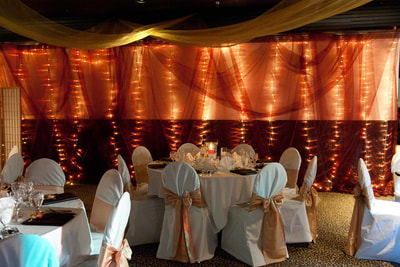 table settings and backdrops for corporate events