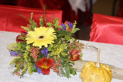 floral table decorations at a private party