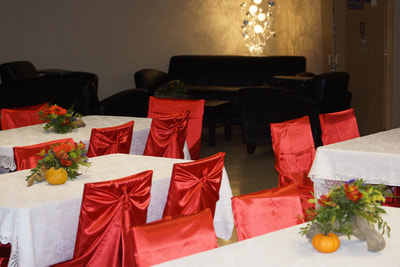 white and red seat and table settings at a private party