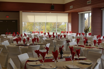 red napkins on tables at a corporate event