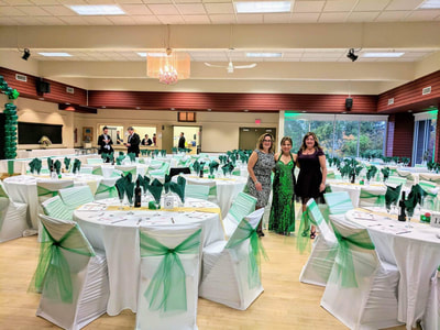 white and green settings at a corporate event